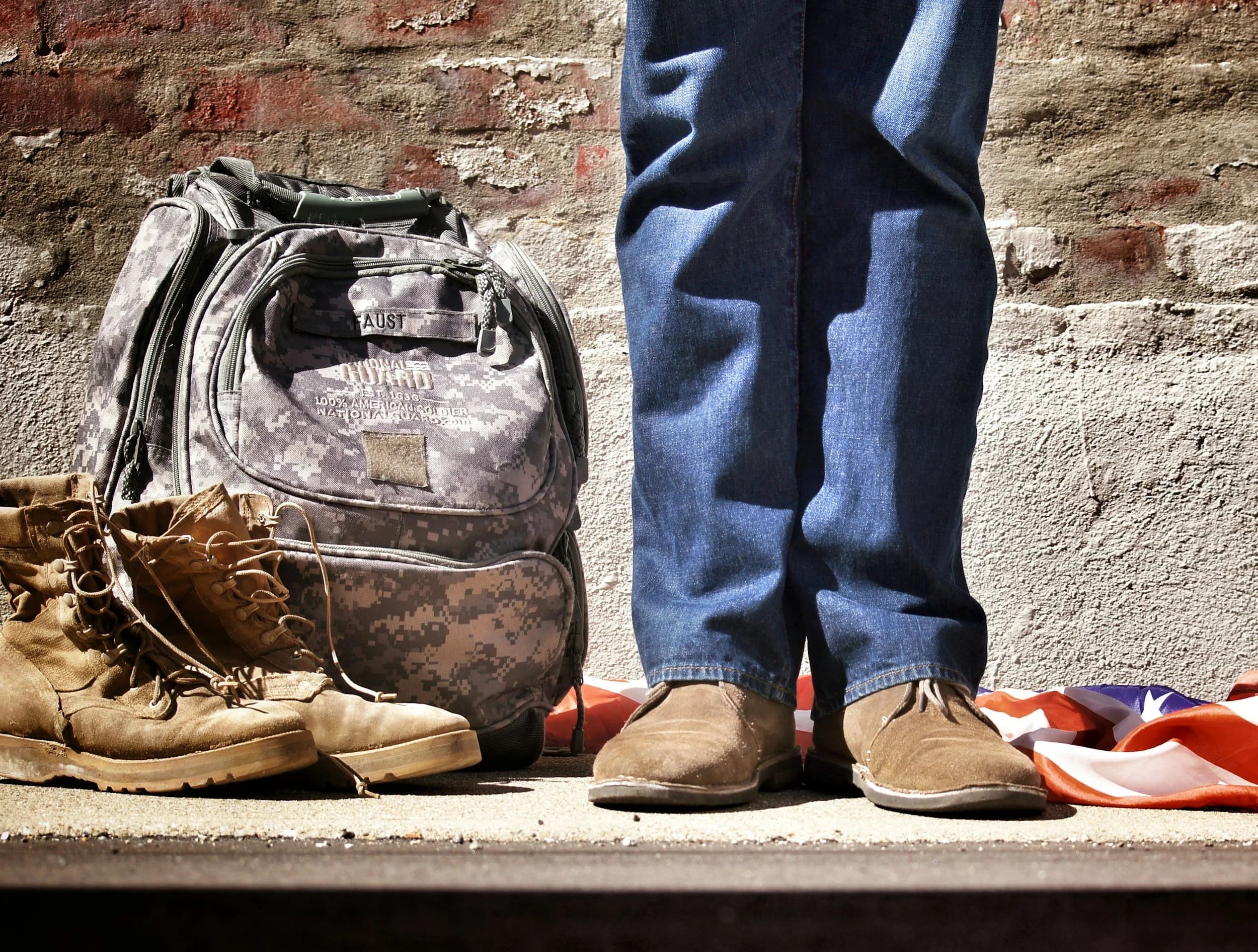 Combat boots and an American flag