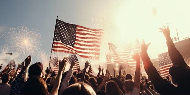 Crowd waving American flags